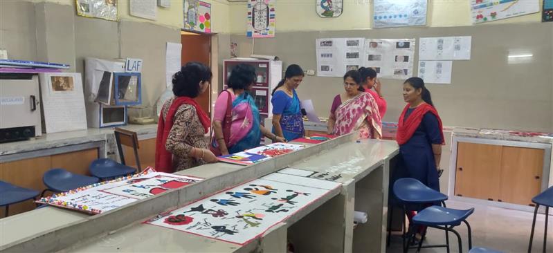 Rangoli making competition is organized by Industrial Microbiology and Botany Department